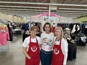 Salvation Army Chic Boutique showroom designer Maggie Austin with Reflections on Style chairs Mary Maxey and Kristy Liedtke (Photo by Shelby Hodge)