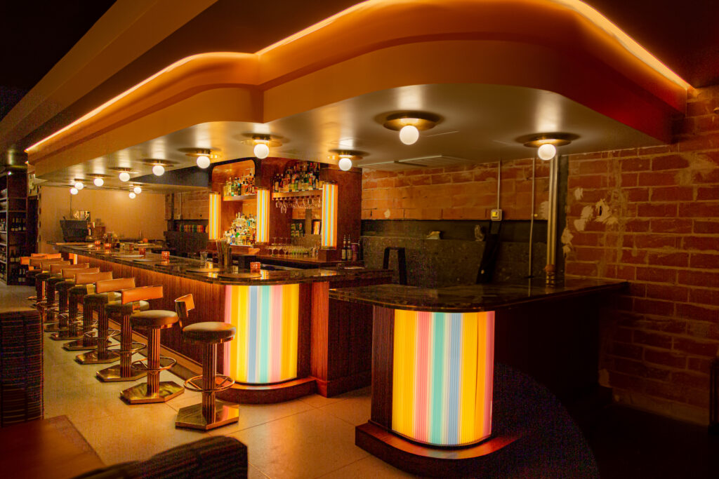 The interior of the new French eatery Eau Tour where created by Garnish Design.  (Photo by Jenn Duncan)