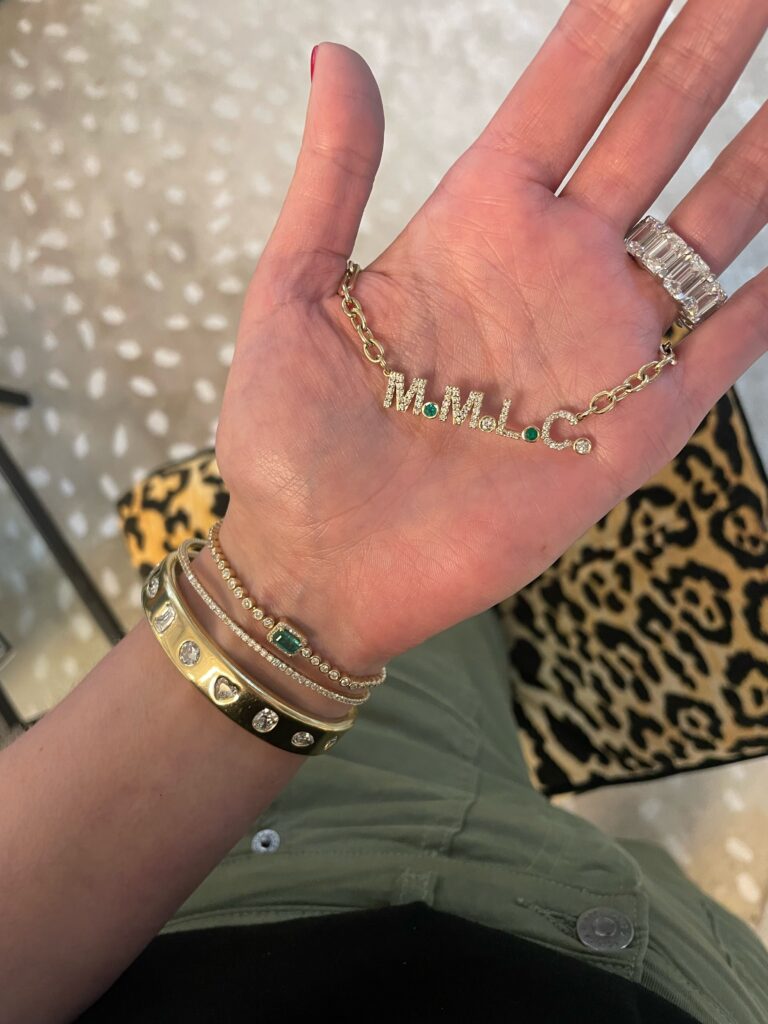 Milliard's Birthstone Initial Necklace is one of the company's most beloved pieces with its clients.