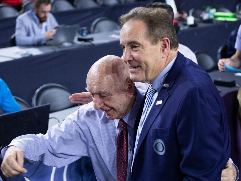 Dick Vitale came over to share a moment with Jim Nantz.  (Photo by F. Carter Smith)