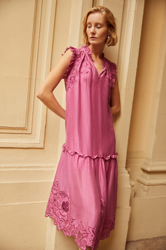 The best-selling Gemma Dress features ruffle details at the neck and sleeves and comes with a self-tie belt.