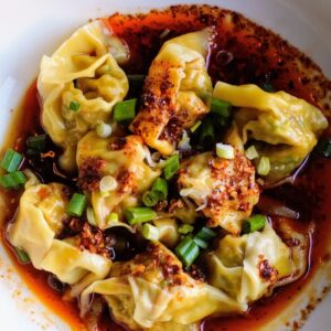 Teddy Wong’s brings delicate dumplings swimming in house-made chili oil.