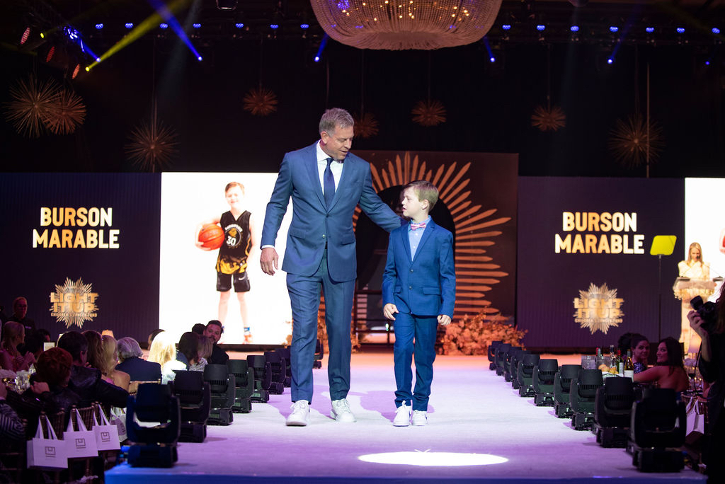 Troy Aikman, Burson Marable (Photo by BFA and Tamytha Cameron)