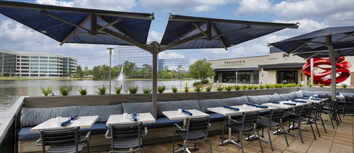 The view of Lake Woodlands from the patio at Azzurro Italian Coastal Cuisine is perfect for an outdoor meal.