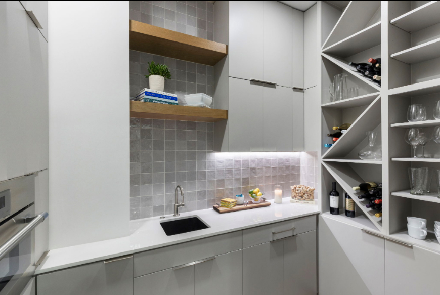 The pantry has a prep sink and plenty of storage space at 114 S. Timber Top in Grogan's Mill.