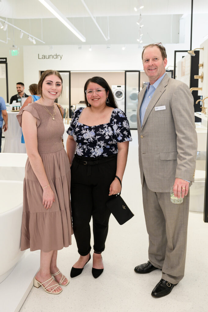 Ashley Barousse, Ana Diosdadu and Reece branch manager Chris Clark make the scene at the Reece Bath+Kitchen opening party.