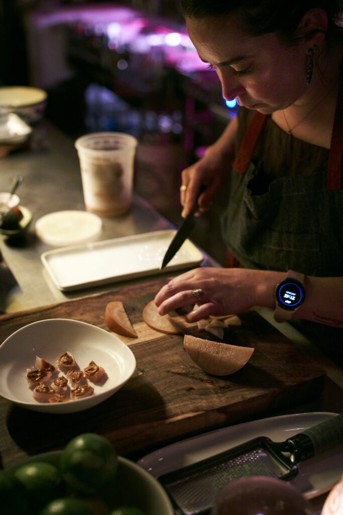 Joined behind the bar in a small makeshift kitchen is chef Madelyn Lester who deftly puts out small Mexican-style snack food. (Photo by Pär Bengtsson)