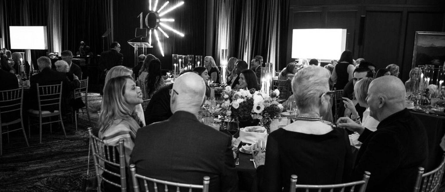 Guests seated at dinner (Photo by Tamytha Cameron and Celeste Cass)