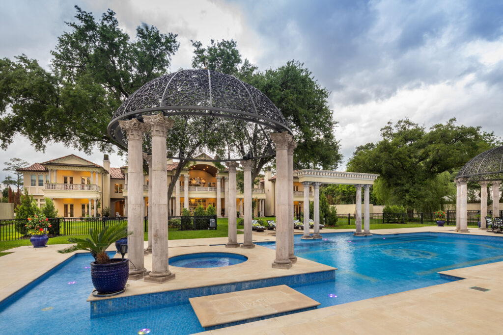 Another view from the pool pavilion to the home The pool pavilion at 6 West Rivercrest in Briar Forest 