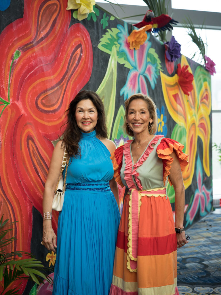 Geraldina Wise, Rebecca Reyes  at the Latin Women's Initiative fashion show and luncheon. (Photo by Daniel Ortiz)
