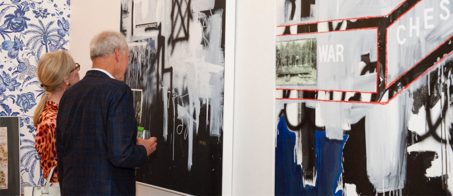 Guests viewing William Atkinson's works (Photo by Mark Anthony Nelson)