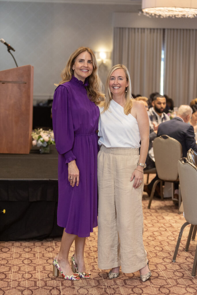 Joanie McLeod, Eryn Ebaugh at the Arms Wide luncheon. (Photo by Jenny Antill)