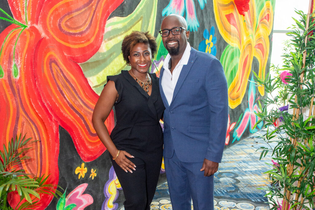 Lanita Jackson, Evans Charles at the Latin Women's Initiative fashion show and luncheon. (Photo by Jacob Power)