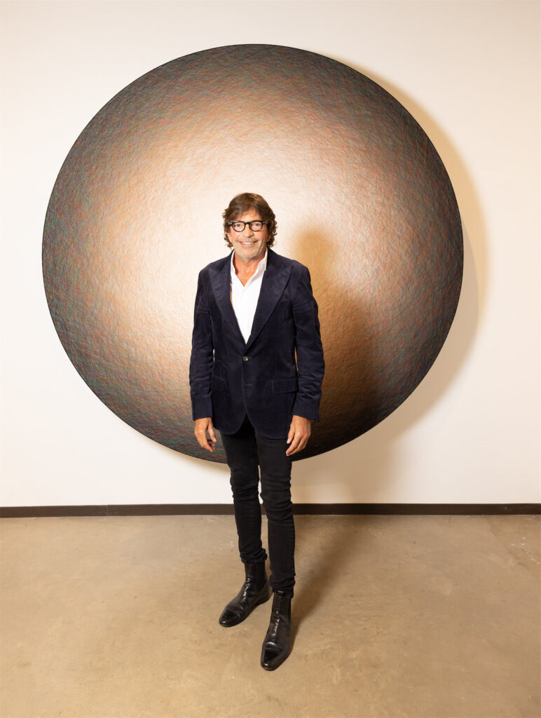 Mark Moussa with Emil Lukas' #1600 Convergent Heat, 2018 at Dallas Art Fair (Photo by Exploredinary)