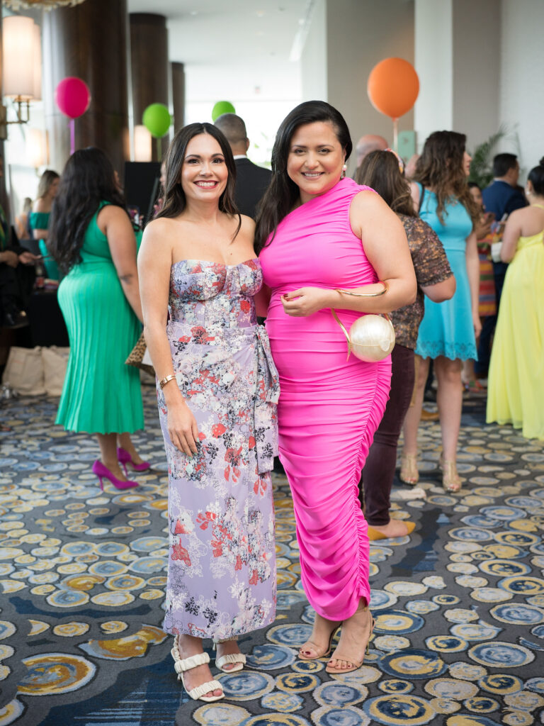Michelle Leal, Daisy Mendozaat the Latin Women's Initiative fashion show and luncheon. (Photo by Daniel Ortiz)