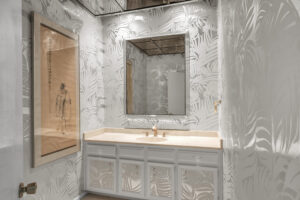 Nash – Silvered palms still sway in a guest bathroom