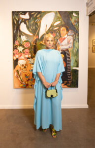 Olivia Ortiz with Cruz Ortiz’s cuando i hear amor eterno i cant help but cry, 2022 at Dallas Art Fair
