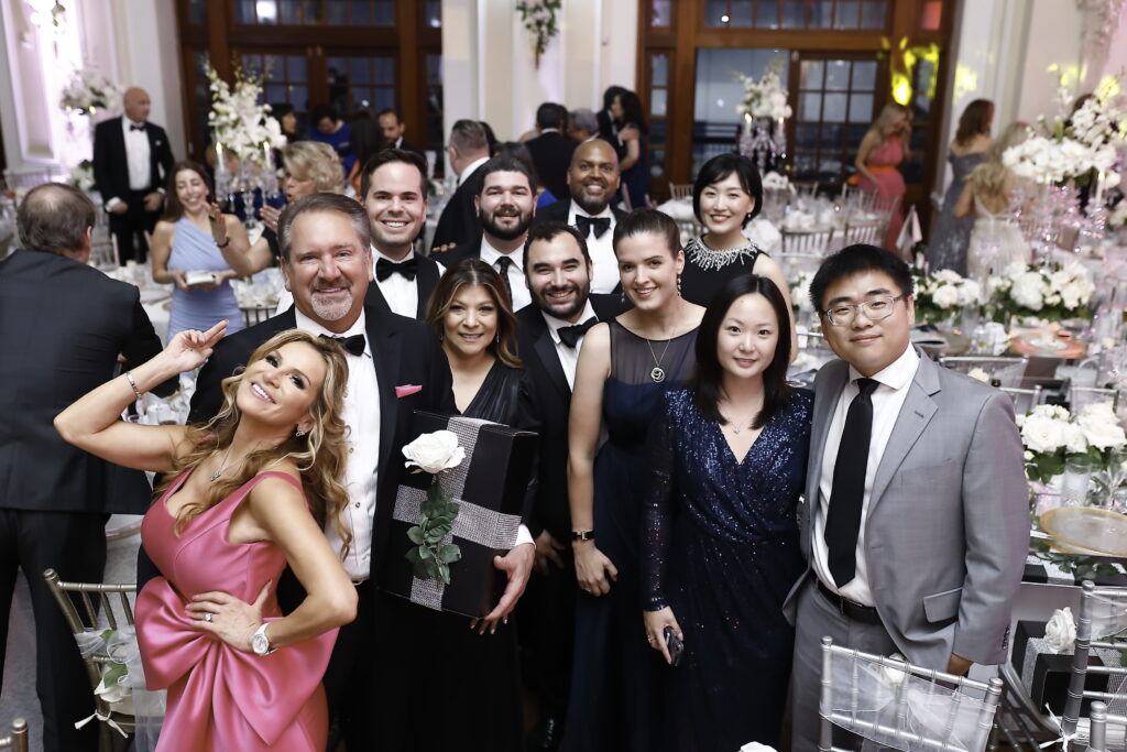 Debbie & Steve Polotko, Petra Martinez, Luis & Clare Quintero, Melanie Udie, Yixin Qian (Back Row) Remington Bruce, Trevor Wiedman, Demond Monteilh, Shanshan Wei at the KNOWAutism gala (Photo by Quy Tran)