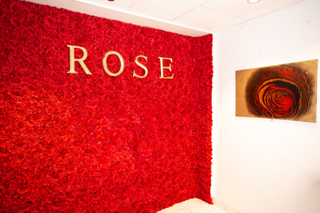 The wall of roses at Rose Rooftop on Waterway Avenue. 