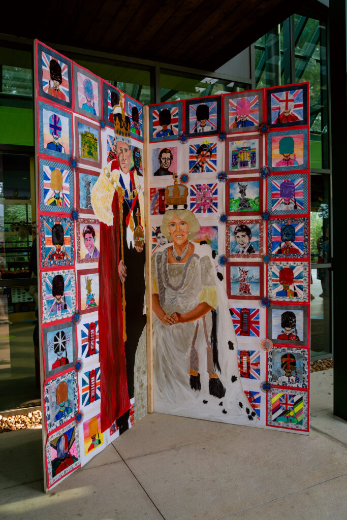 Students from the British International School of Houston created the colorful mural for the British Consulate's celebration of King Charles coronation. (Photo by  Joffre Camacho, Square Foot Photography)