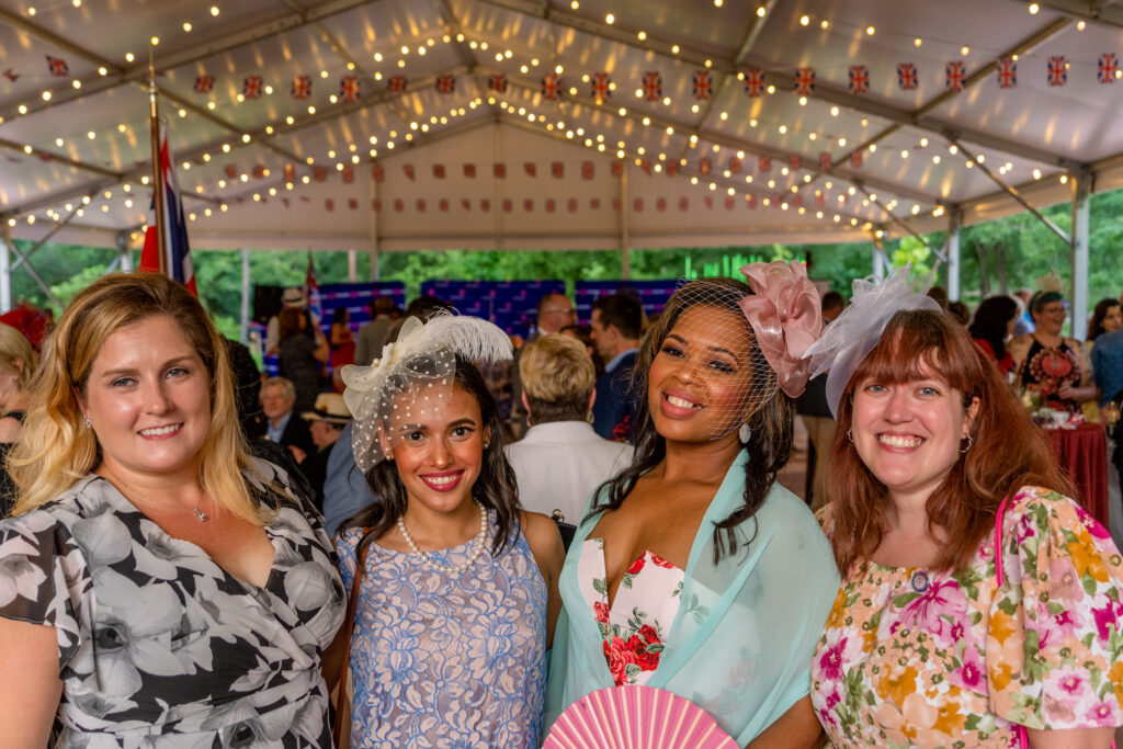Guests of the British Consulate attend the invitation-only party celebrating King Charles' coronation. (Photo by  Joffre Camacho, Square Foot Photography)