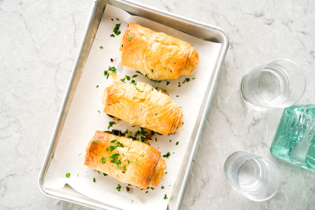 It doesn't get more Greek than spanakopita, the spinach-filled phyllo-wrapped savory pastry at Echoes Cafe. (Photo by Rebekah Flores)