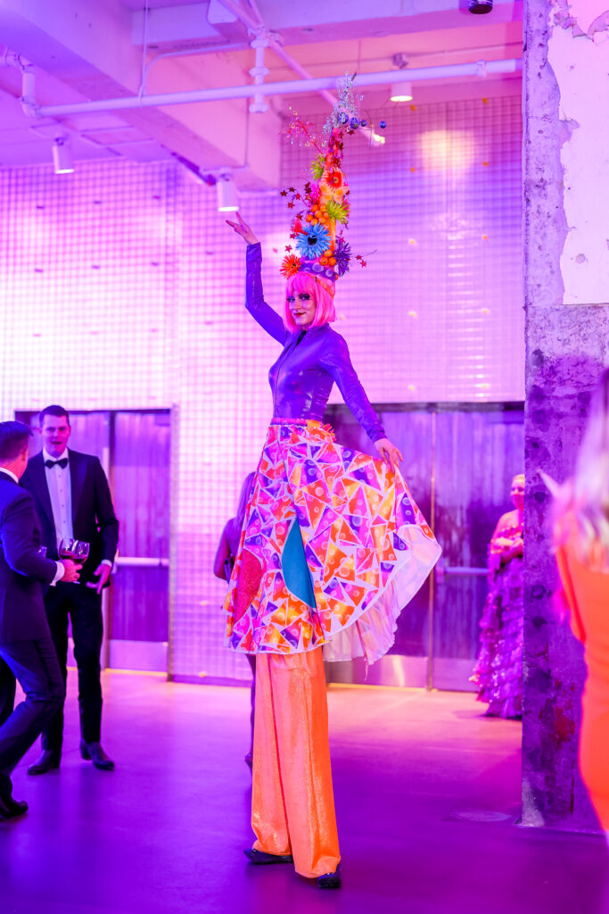 A stilt walker is part of the themed entertainment at the Children's Fund gala, held at the 713 Music Hall (Photo by Gilded Sun)