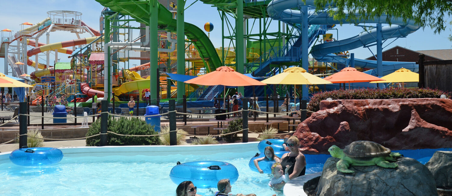 Water – Guests take a break from the waterslides in the lazy river at Hawaiian Falls Roanoke.