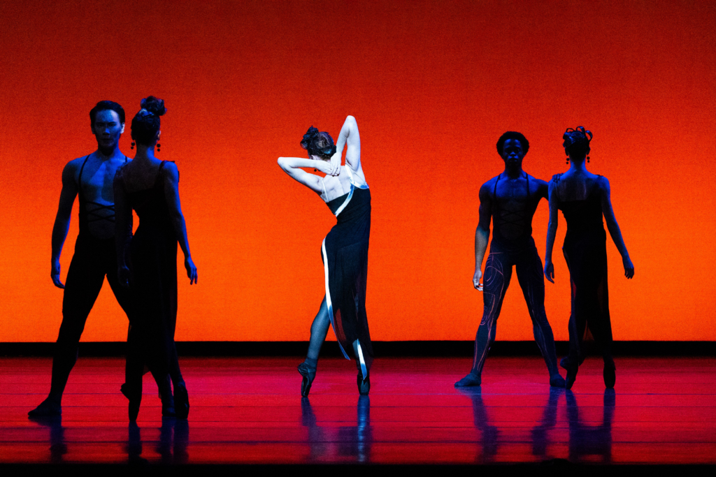 Houston Ballet soloist Alyssa Springer and artists of Houston Ballet in Stanton Welch's "Divergence." (Photo by Lawrence Elizabeth Knox. Courtesy Houston Ballet)