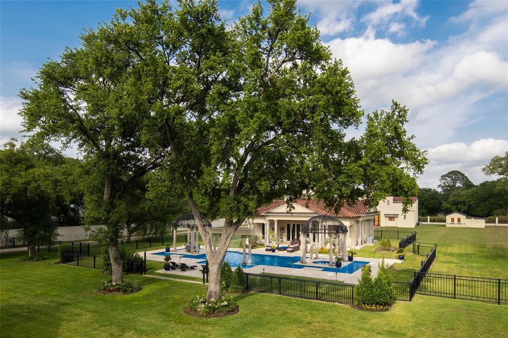 The pool pavilion at 6 West Rivercrest in Briar Forest speaks to Palladian influences