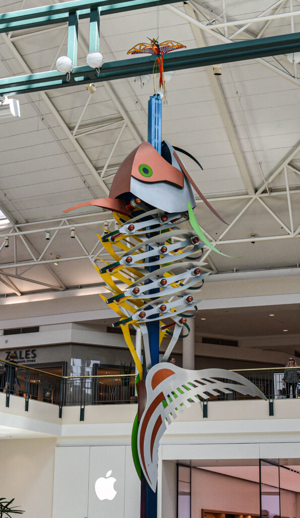 A colorful piece of art hangs in The Woodlands Mall. The Woodlands boasts 86 pieces of public art throughout the community. (Photo by Jessica T. Payne)