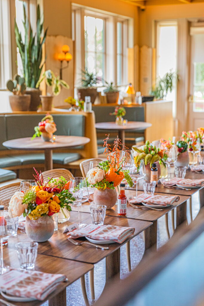 The beautiful table setting, complete with peppers in the floral arrangements. (Photo by Zachary Horst)