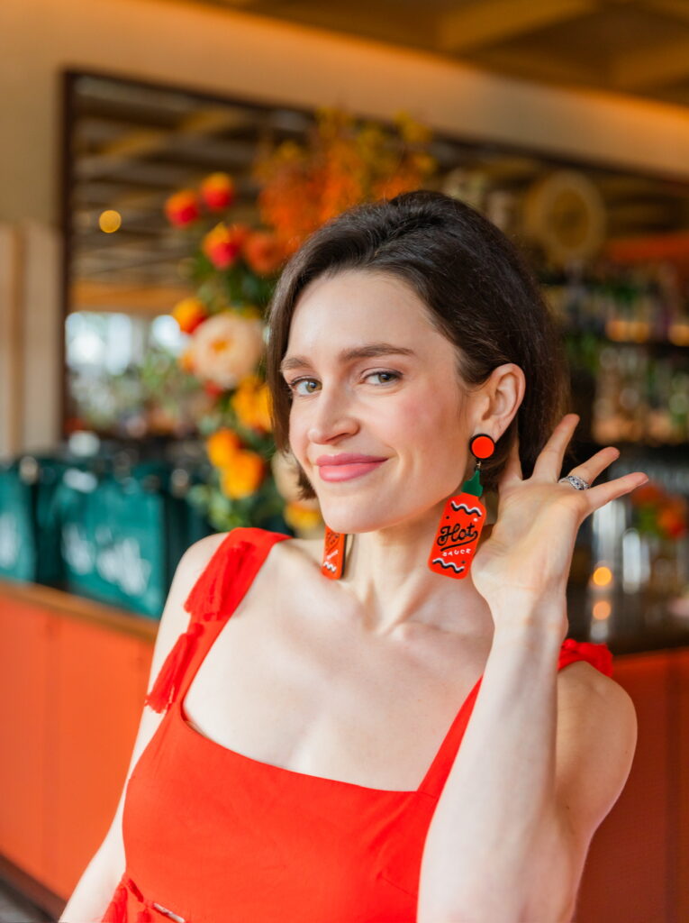 Maggie Jenkins shows off her on-point earrings. (Photo by Zachary Horst)