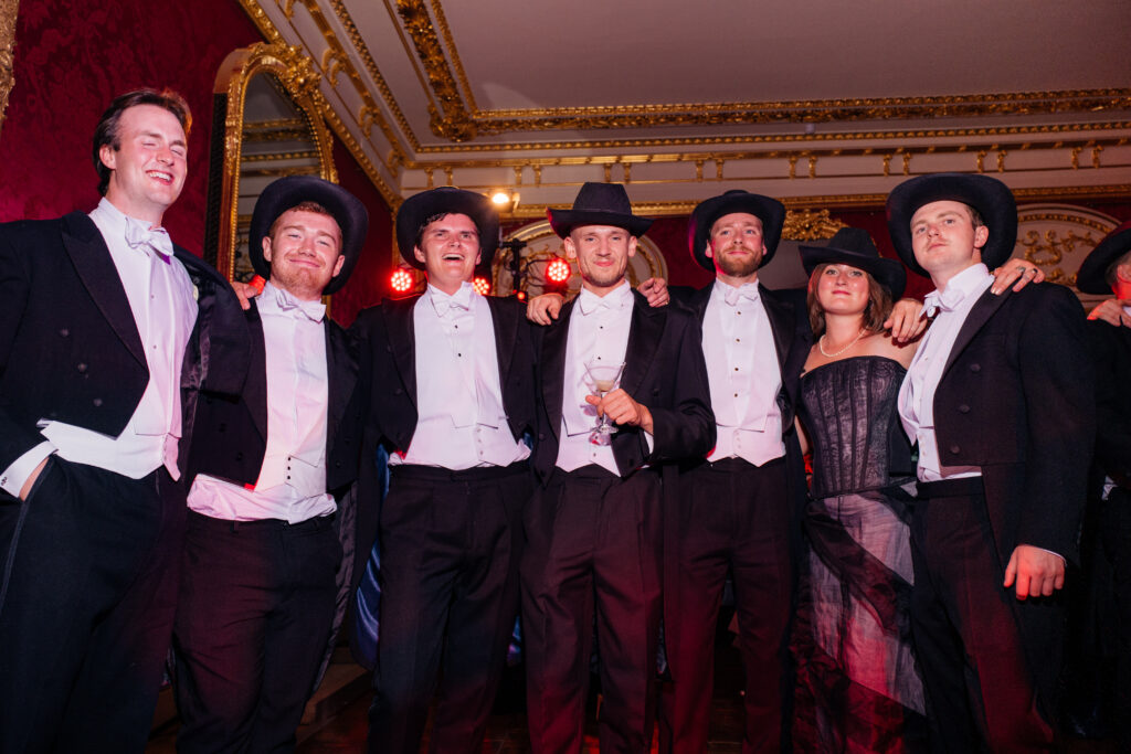 The handsome gents attending the Skylar Pinchal and Oliver Coysh wedding festivities don western hats in a nod to Skylar's Texas heritage.