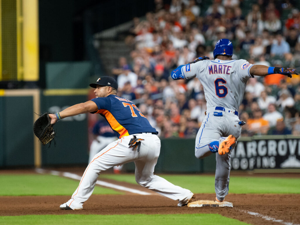 Houston Astros shortstop Jeremy Pena threw out Sterling Marte at first on a spectacular play. (Photo by F. Carter Smith)