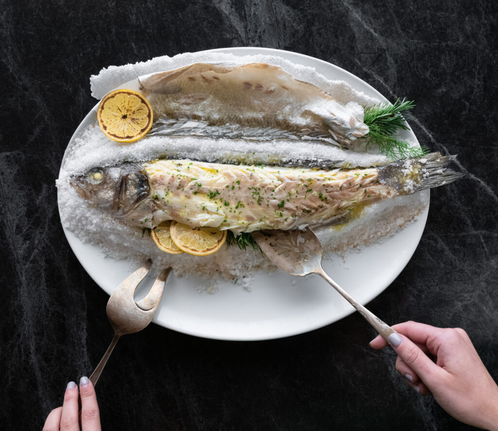 A salt-crusted branzino served at the new Italian restaurant Bari Ristorante. (Photo by Debora Smail)