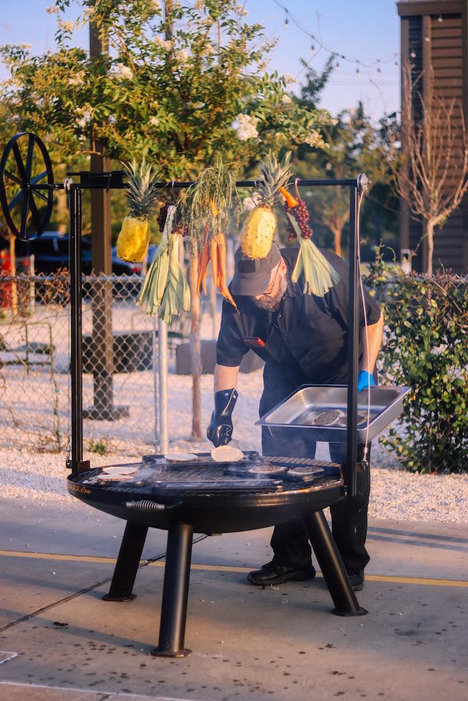 Chef's team preparing the grill at the SEBAS Foundation Live Fire Event  (Photo by AM Photography)
