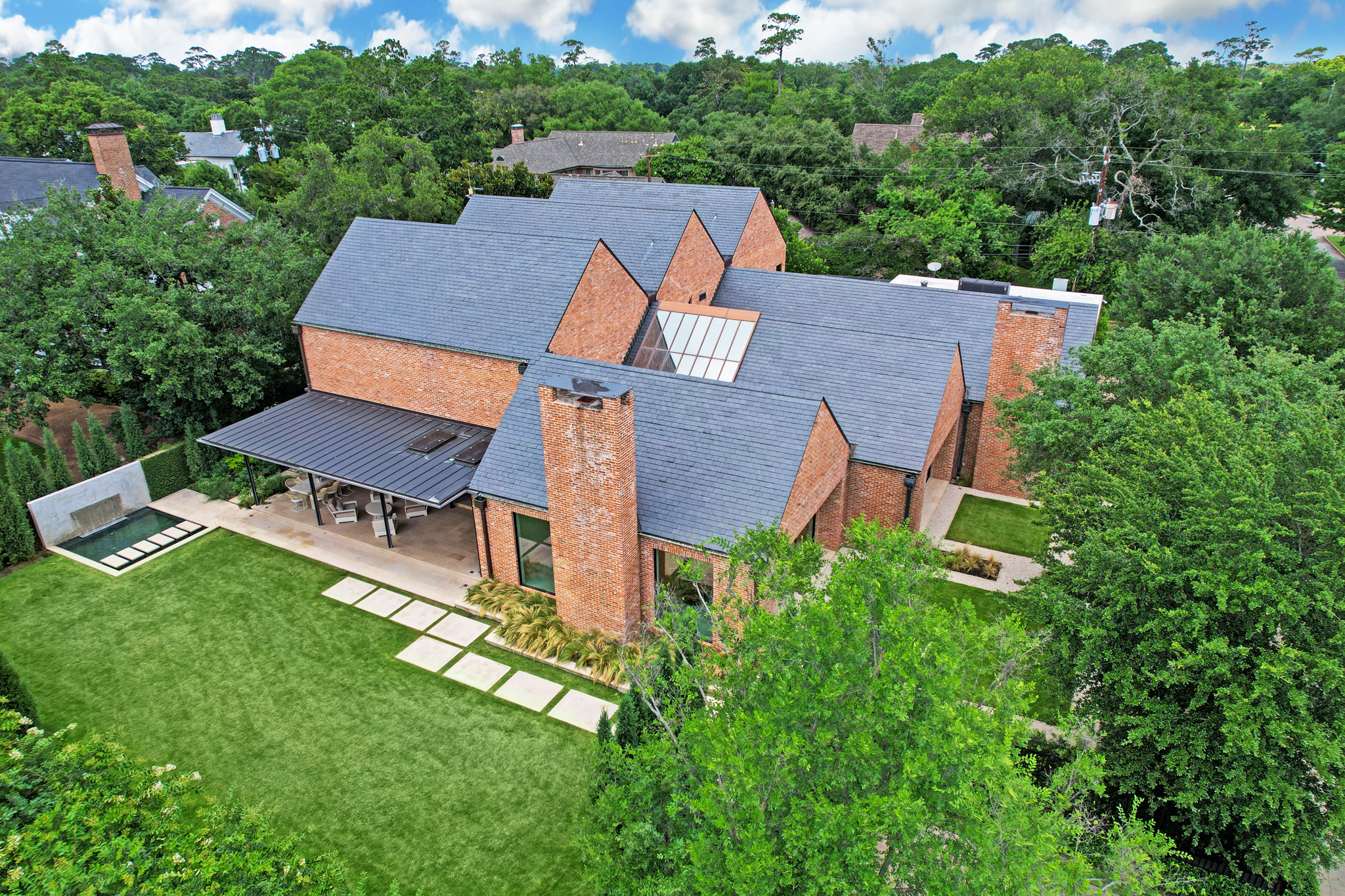 The River Oaks home at 3404 Chevy Chase was designed by renowned architect S.I. Morris for construction mogul Leo Linbeck Jr. It is on the market with Greenwood King Properties.