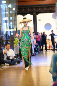 Chloe Dao Runway – Green Pattern Dress (1) (Photo by Ken Jones)
