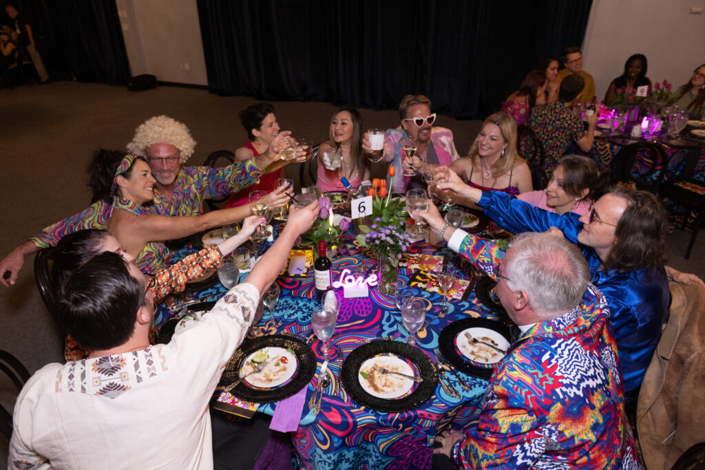 Guests make a toast to 1960 at the Heritage Society Love Street Gala (Photo by Wilson Parish)