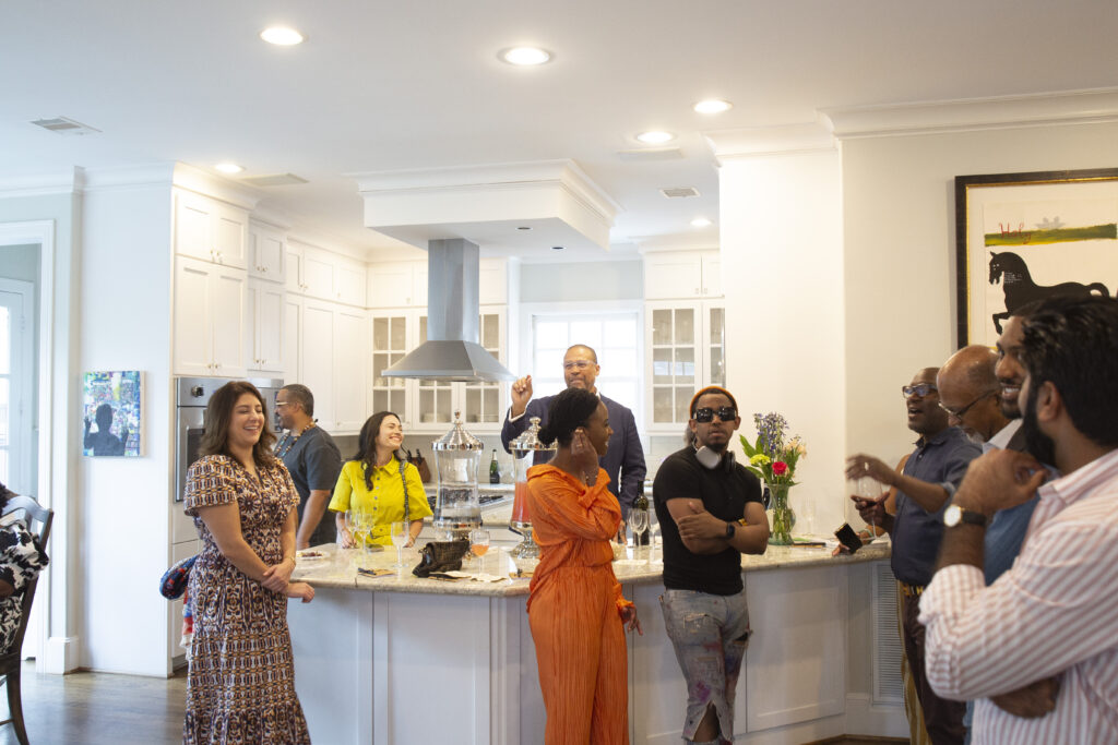 Madyson Chavez, Marc Furi, Michele Leal, Natalya Milton, Nicholas Stuart, Wayne Bell, host Garfield Johnson, Barry Barnes, Danté Milton, Alim Adatia at the March Emerging Collectors Brunch (Photo by Mark Francis)
