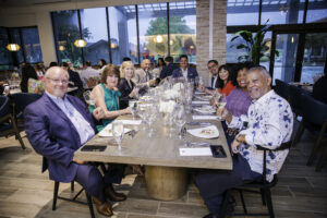 Ron and Marty Saikowski, Laura Landsbaum, Jeff Brown, Simon Solomon, David Federico, Constance McDerby, and Angie and D'Artagnan Bebel in the newly renovated Harrison's at The Woodlands Resort enjoyed the Wine & Food Week kickoff.