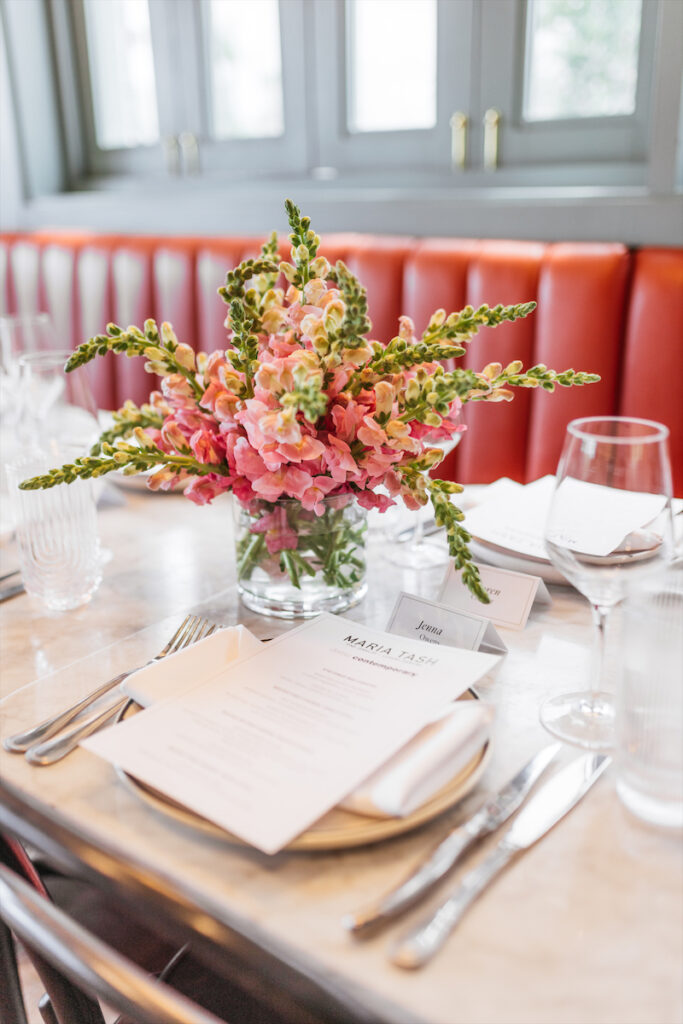 Floral arrangements by Nolan Kiser decorated the tables