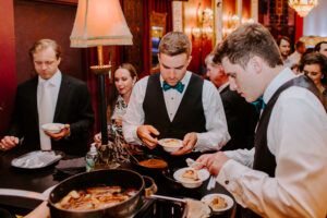 Guest at Flambe Station 1[1] (Photo by Bailey Connor Catering)