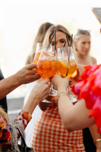 Guests lean in for a cheers (Photo by Vanessa Christina)