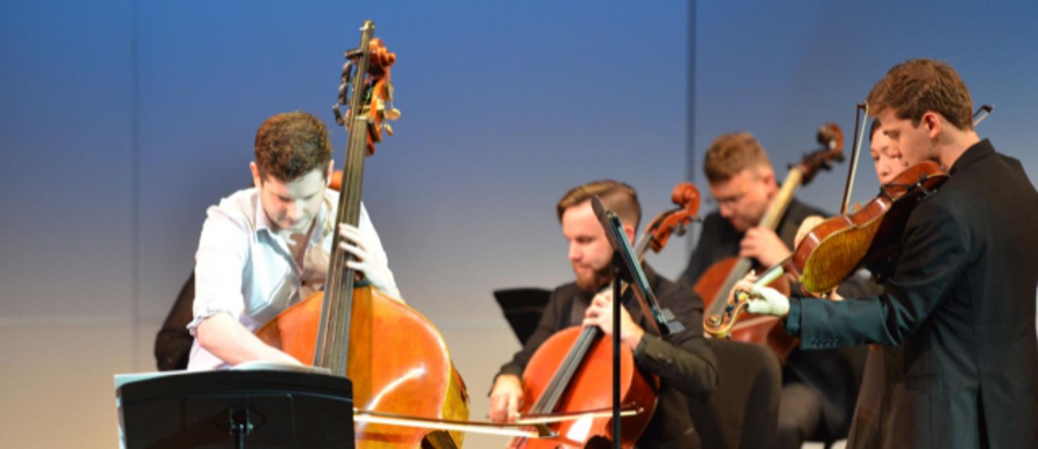 Soloist and Cleveland Symphony first assistant double bassist Charles Paul, is the composer’s musical voice in Theo Chandler’s love story for soprano, double bass and string orchestra, with text by the composer. (Photo by Jeff Grass. Courtesy Kinetic Ensemble)