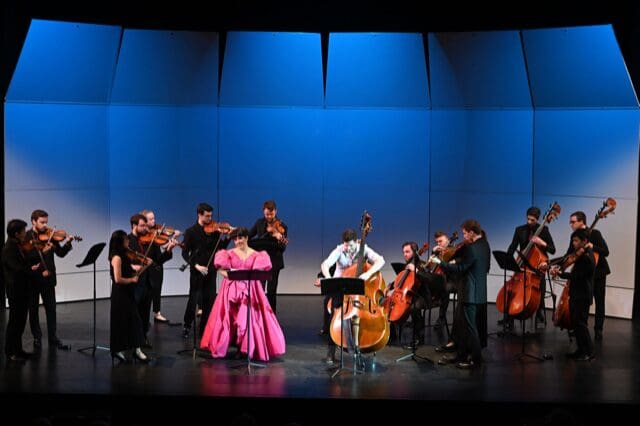 Soloists soprano Alexandra Smither and double bassist Charles Paul perform with members of the Kinetic Ensemble in Theo Chandler's "Beyond the Sanctuary Walls," in its world premiere at MATCH Theater on May 26. (Photo by Jeff Grass. Courtesy Kinetic Ensemble)