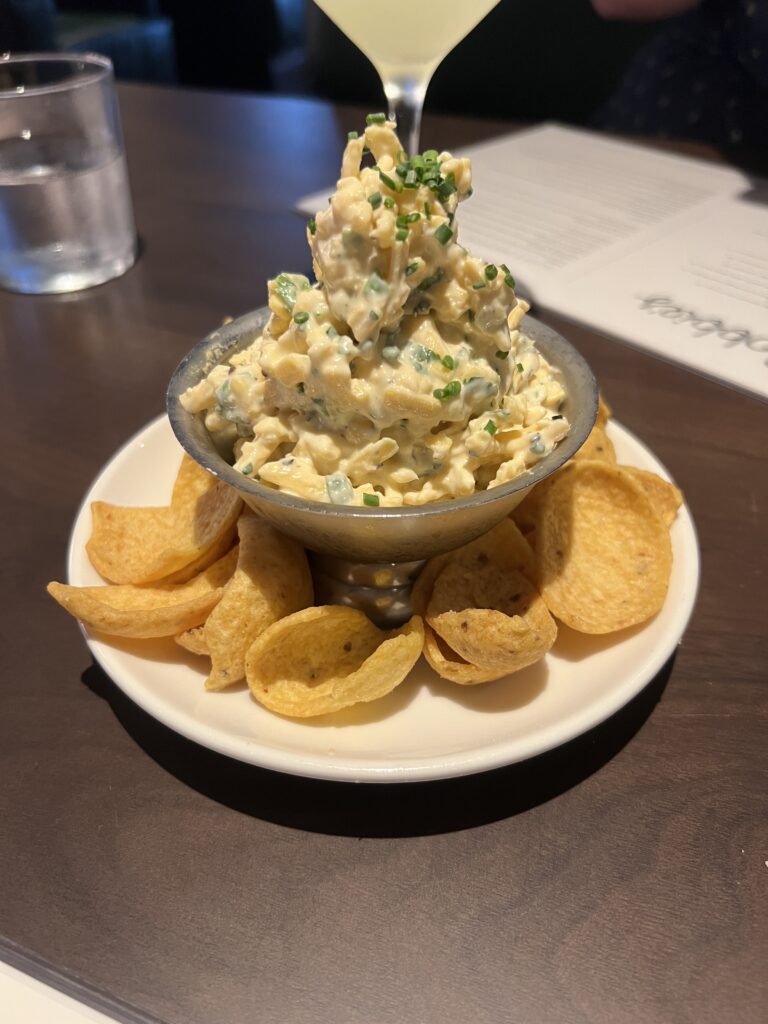 Bobbie's Airway Grill offers a sharp cheddar cheese dip starter served with Fritos. (Photo by Megan Ziots)