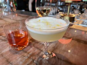 Le Margot – The City of Lights in the foreground, with egg white foam and orange zest.