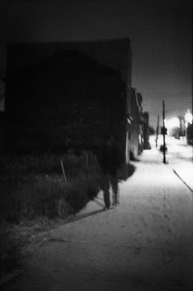 Ming Smith's "Invisible Man," 1991. This photograph appears on the cover of a book focused on Ming Smith's work entitled "Invisible Man, Somewhere, Everywhere," written by Oluremi C. Onabanjo and published by the Museum of Modern Arts, New York City. (Courtesy Barbara Davis Gallery)